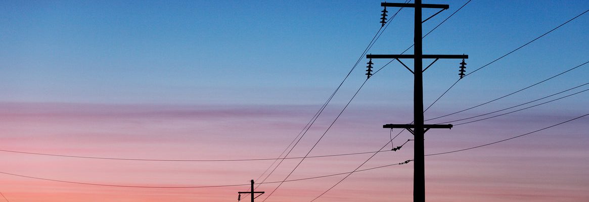 Beautiful view of power lines at sunset.